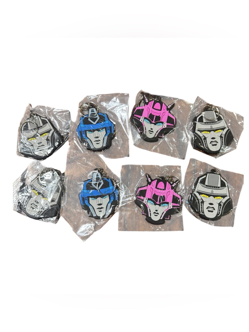 8 Transformers keychains NEW